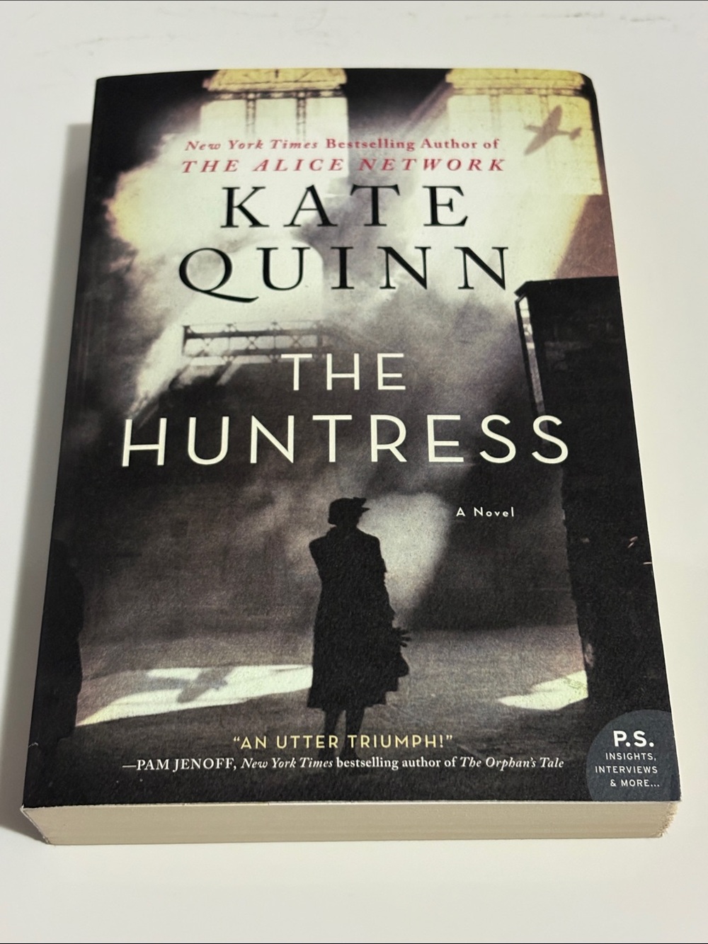 kate quinn The Huntress — Black, Cream & Gold Paperback Cover